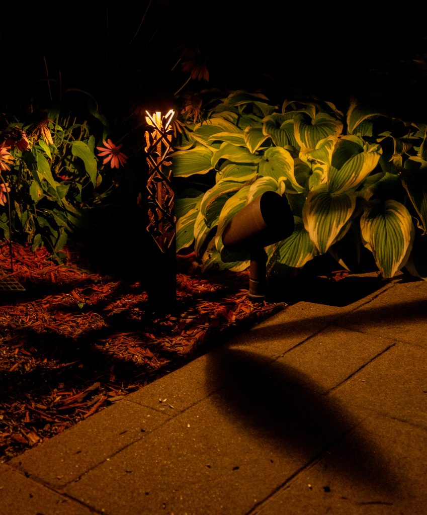 Outdoor Audio Speaker and Custom Bollard at night